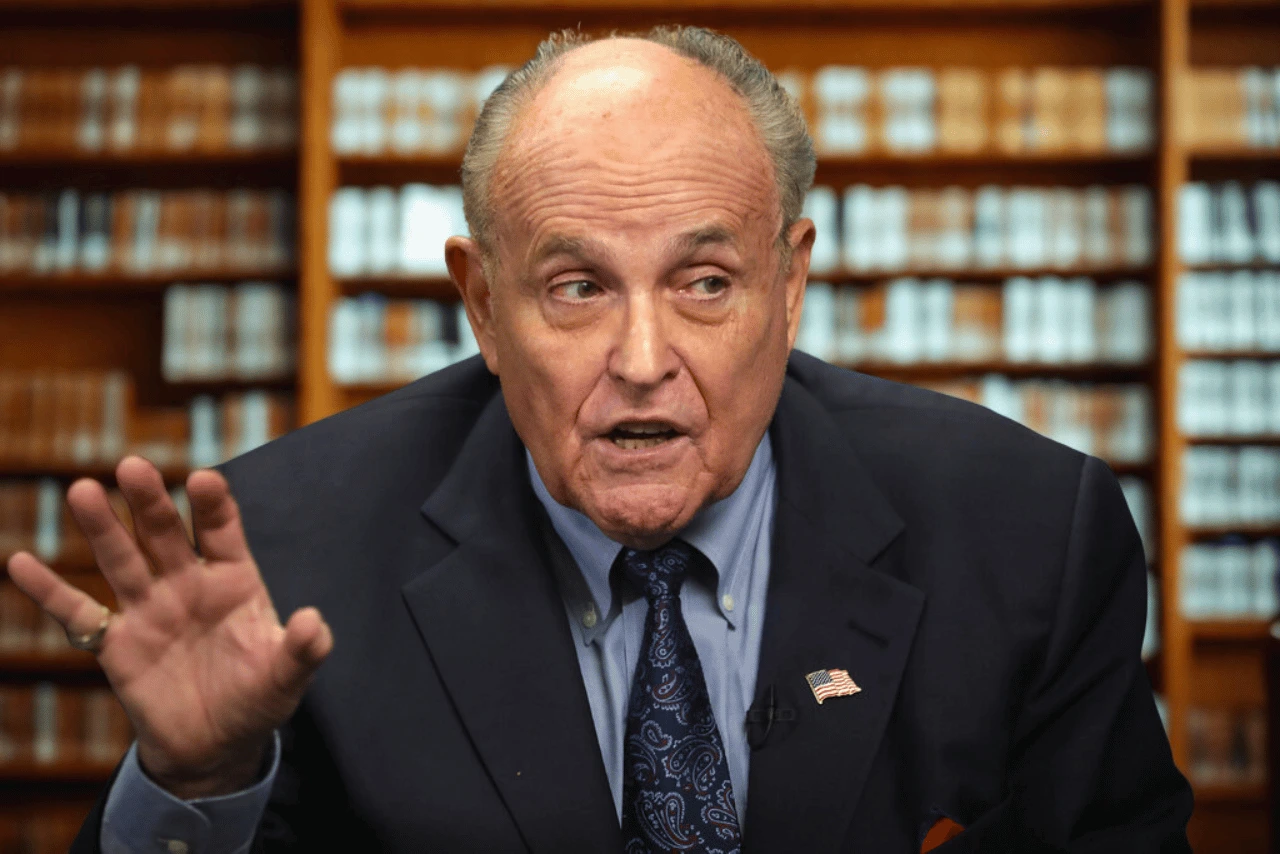 Former Mayor Rudy Giuliani speaking with the media