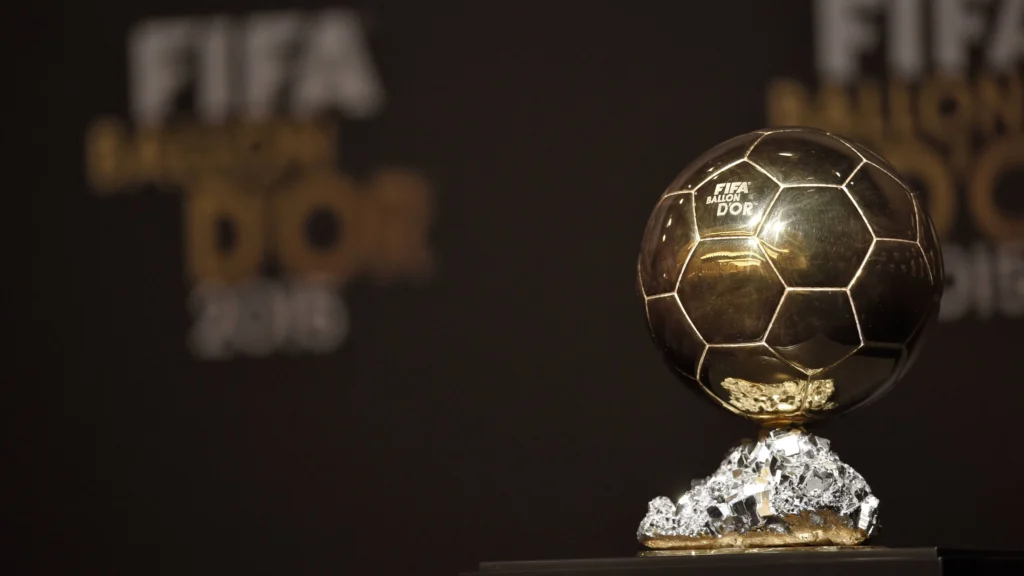 Ballon d’Or 2025 trophy with nominees Ousmane Dembélé and Lamine Yamal in contention